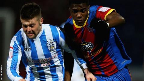 Oliver Norwood (left) and Wilfried Zaha
