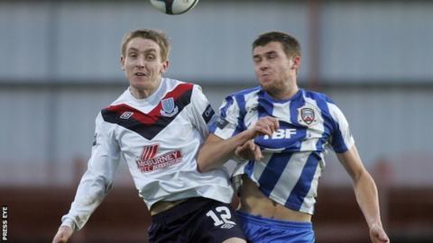 Ally Teggart of Ballymena United in action against Coleraine's Stephen Lowry