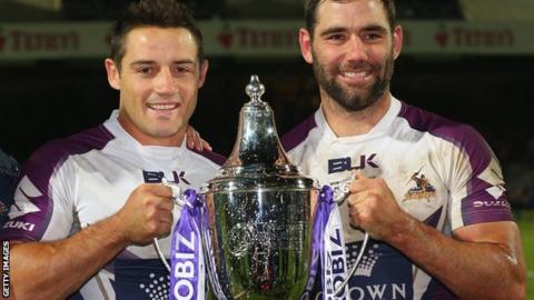 Melbourne Storm's Cameron Smith and Cooper Cronk with the World Club Challenge trophy