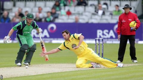 Australian bowler Ben Hilfenhaus dives for the ball against Ireland at Stormont last year