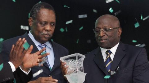 Confederation of African Football president Issa Hayatou (left) and Jacques Anouma
