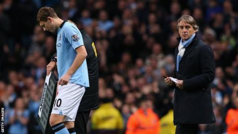 Edin Dzeko and Roberto Mancini