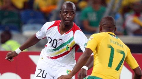 Samba Diakite (left)