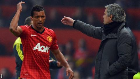 Nani (left) walks past Real Madrid manager Jose Mourinho after his dismissal