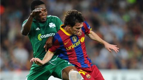 Simao Mate (left) in action for Panathinaikos against Lionel Messi of Barcelona
