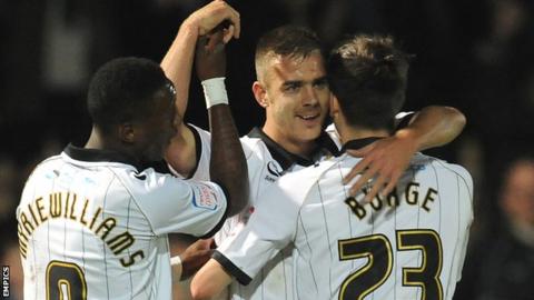 Tom Pope celebrates scoring for Port Vale