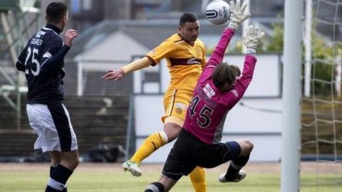 Michael Higdon scores for Motherwell against Dundee