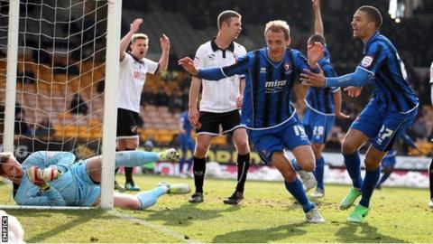 Paul Benson celebrates scoring for Cheltenham against Port Vale