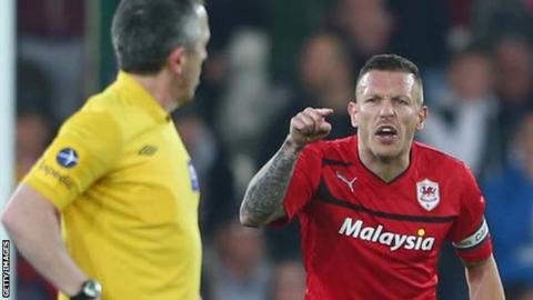 Cardiff's Craig Bellamy remonstrates with the referee after Barnsley's late equaliser