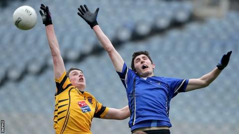 Maghera's Peter Cassidy battles with Navan's Donal Ryan
