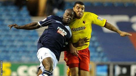 Danny Shittu and Troy Deeney