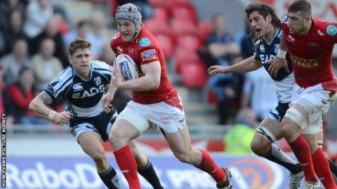 Jon Davies races away to score a try for Scarlets