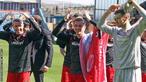 Andrew Taylor (centre) celebrates with Kevin McNaughton and David Marshall