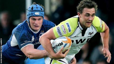 Leinster's Rhys Ruddock tackles Ashley Beck of Ospreys
