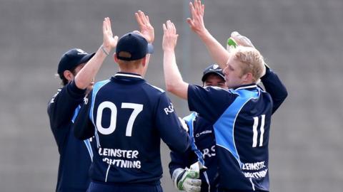 Eddie Richardson celebrates after taking a wicket