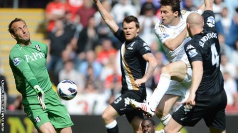 Swansea's Michu is denied by Mark Schwarzer