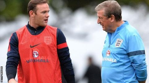 Wayne Rooney (left) and Roy Hodgson