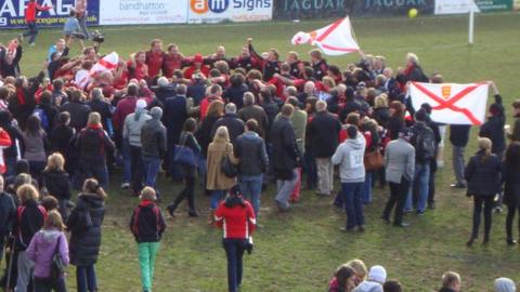 Jersey celebrate promotion at Coventry last April