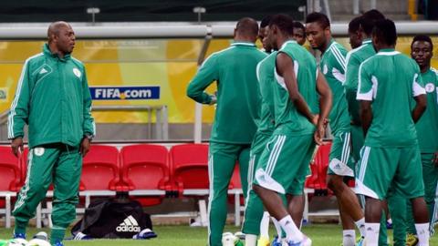 Stephen Keshi (left) oversees Nigeria training