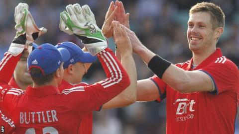 Boyd Rankin is congratulated by England team-mates after taking the wicket of New Zealand's James Rankin