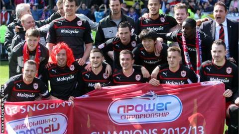 Cardiff City celebrate winning the Championship title after their 1-1 draw at Burnley