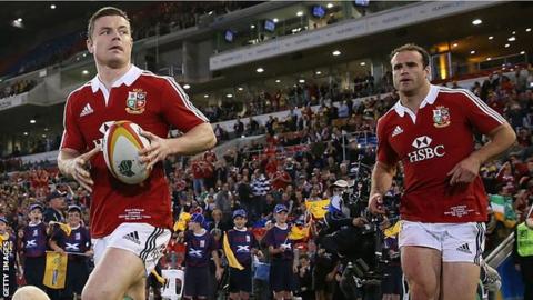 Brian O'Driscoll and Jamie Roberts run onto the field for the Lions against the Waratahs