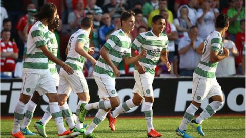 Celtic celebrate their opening goal against Cliftonville