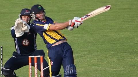 Chris Cooke hits a four against Northants