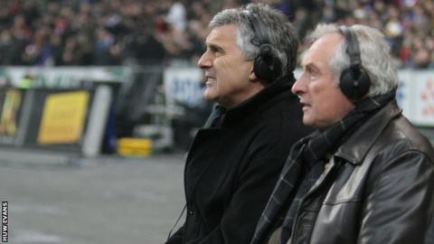 Gareth Davies (left) alongside Gareth Edwards while working as a television pundit