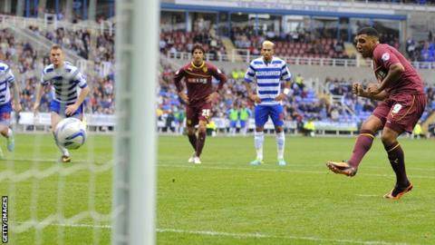 Troy Deeney scores a penalty for Watford at Reading