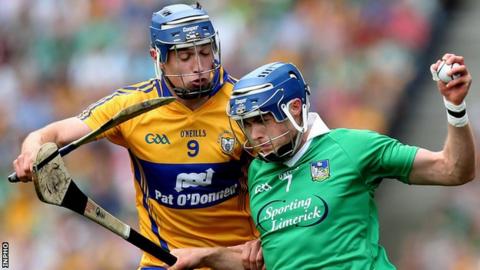 Clare's Colin Ryan challenges Limerick's Gavin O'Mahony