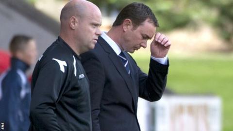 Derek Adams (right)
