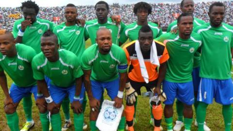 Ibrahim Teteh Bangura (second from left, front row) lines up with the Sierra Leone team