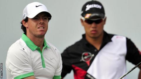 Rory McIlroy (l) and Hideki Matusyama
