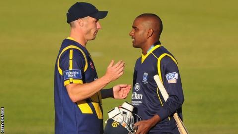 Simon Jones of Glamorgan commiserates with Dimitri Mascarenhas of Hampshire