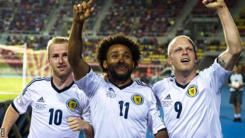 Iketchi Anya (centre) celebrates with Scotland