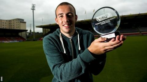 Stuart bannigan with his award