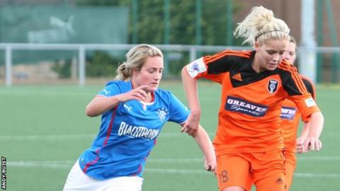 Glasgow City's Denise O'Sullivan holds off Rangers player Hayley Cunningham