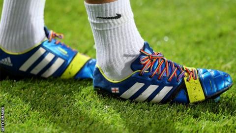 Joey Barton wearing rainbow laces