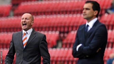 Ian Holloway (left) and Roberto Martinez