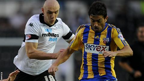 Conor Sammon and Javi Venta (r)