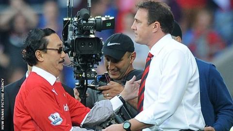 Tan Sri Vincent Tan and Malky Mackay