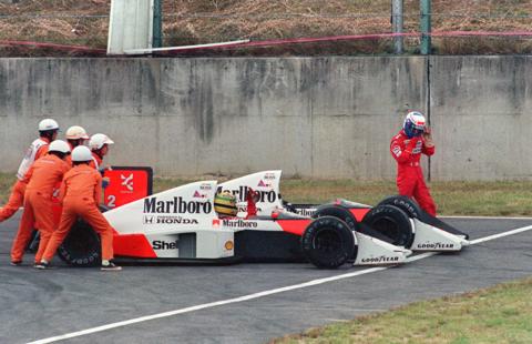 Ayrton Senna and Alain Prost collide at the Casio Triangle chicane in 1989