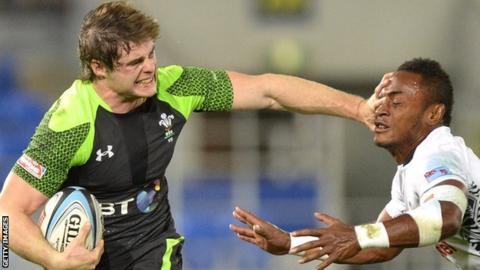 Chris Knight of Wales breaks away against Fiji in the 2013 Gold Coast Sevens