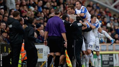 Tranmere players celebrate at Bradford