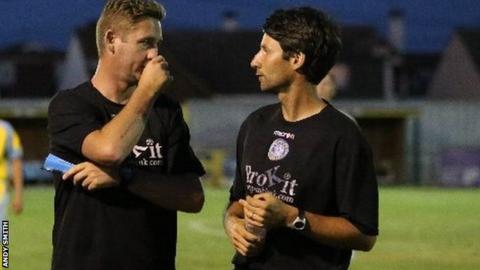 Danny Cowley talks to his staff at a Concord Rangers game