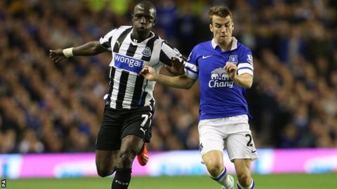 Moussa Sissoko (left) jostles with Everton's Seamus Coleman
