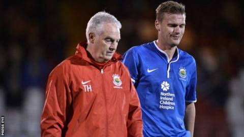 Linfield physio Terry Hayes with striker Peter Thompson