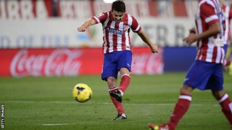 David Villa scores