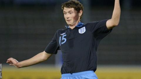 George Evans in action for England U19s against Germany